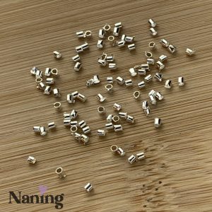 Stopper/rögzítőgyöngy - hosszúkás - 2mm - ezüst